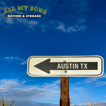 a highway sign points towards Austin