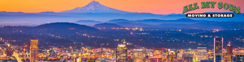 entire portland skyline lit up at dawn with mount hood in the distance