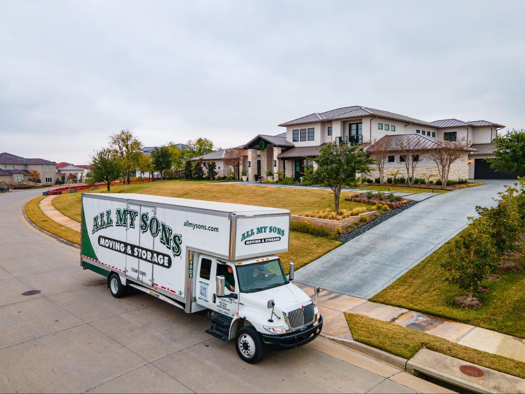 All My Sons Moving truck arrives at a beautiful house to begin an efficient move.